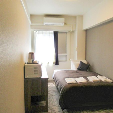 Hotel Livemax Budget Kawasaki Ekimae Екстер'єр фото