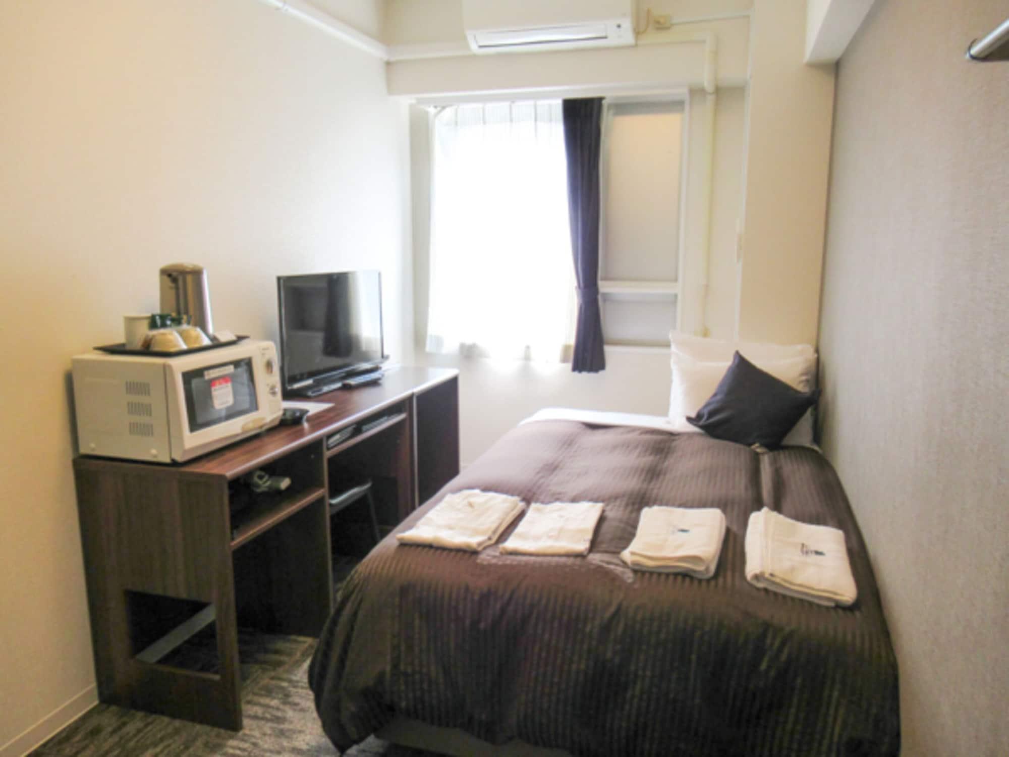 Hotel Livemax Budget Kawasaki Ekimae Екстер'єр фото