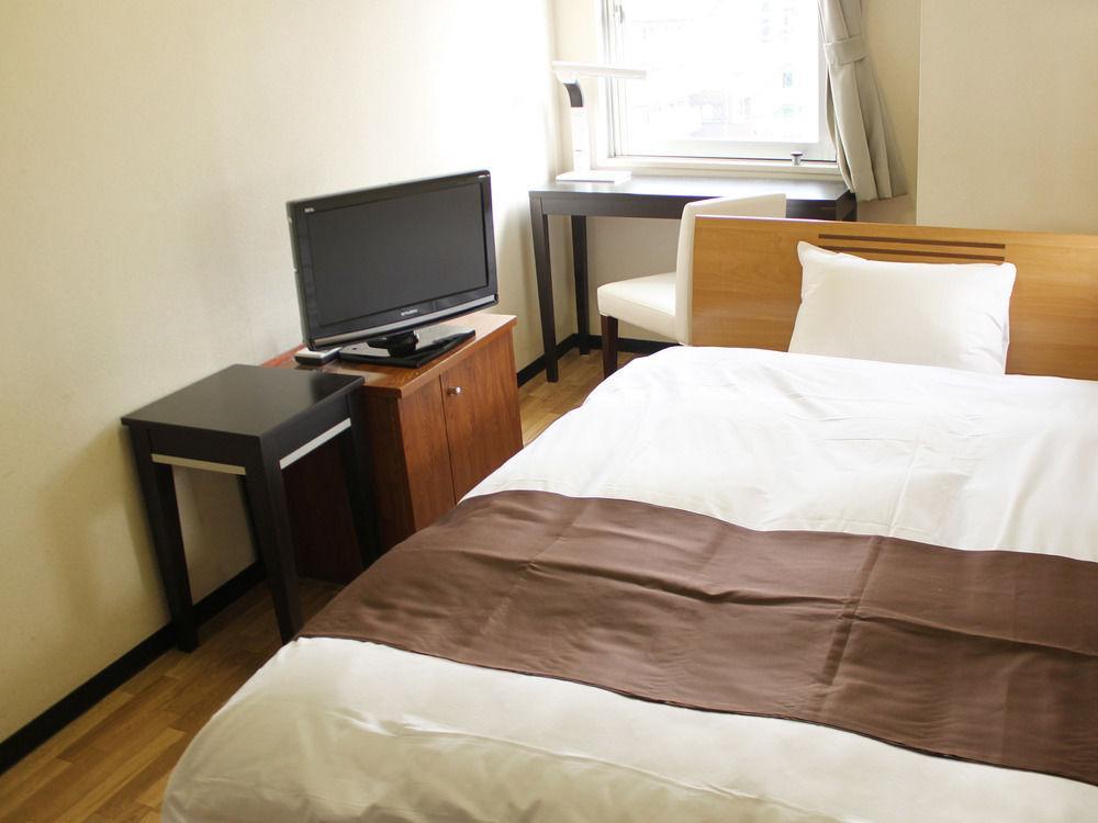 Hotel Livemax Budget Kawasaki Ekimae Екстер'єр фото